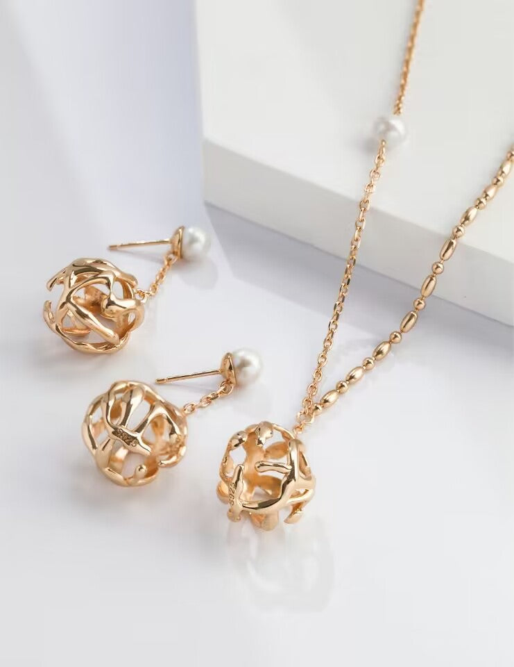 Pearl-Encapsulated Metal Sphere Earrings