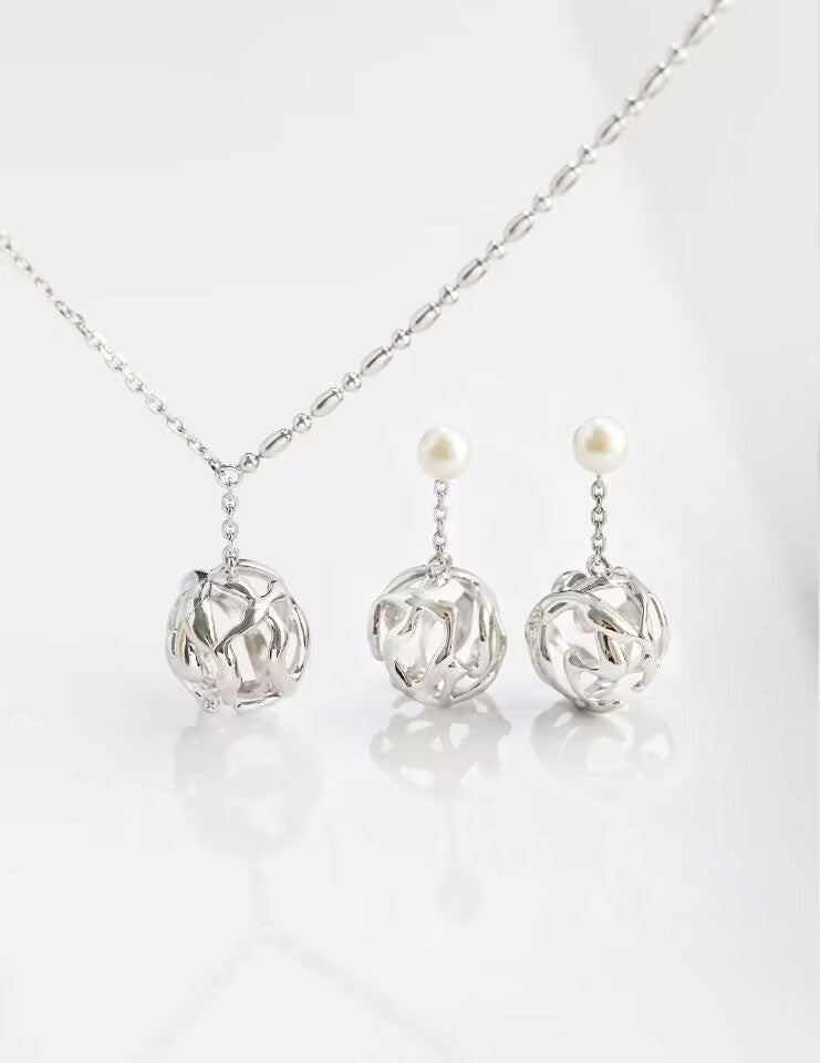 Pearl-Encapsulated Metal Sphere Earrings